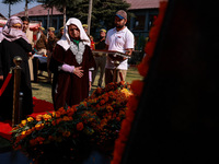 Family members of police martyrs pay tribute to the soldiers who sacrifice their lives in service during Police Commemoration Day in Baramul...