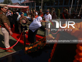 Family members of police martyrs pay tribute to the soldiers who sacrifice their lives in service during Police Commemoration Day in Baramul...