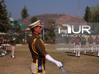 JK Police officials take part in Police Commemoration Day in Baramulla, Jammu and Kashmir, India, on October 21, 2024. Police Commemoration...