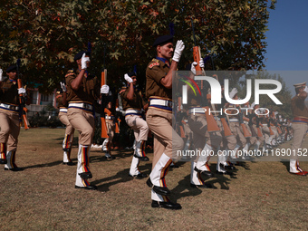 JK Police officials take part in Police Commemoration Day in Baramulla, Jammu and Kashmir, India, on October 21, 2024. Police Commemoration...