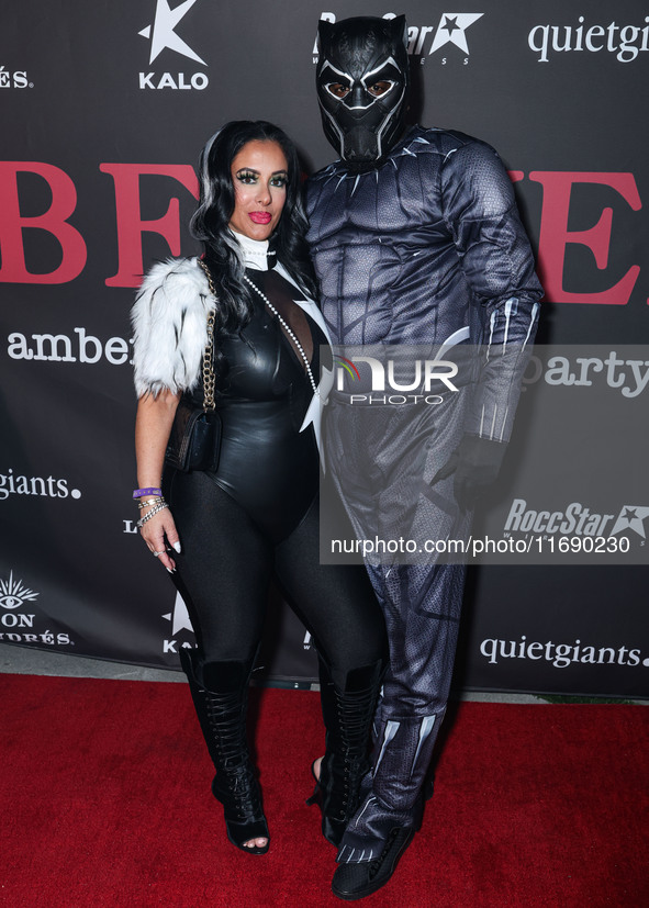 Jannine Vecchil and Gerard Smalls arrive at Amberween - An Amber Rose Birthday Party held at a Private Residence on October 19, 2024 in Tarz...