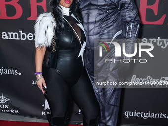 Jannine Vecchil and Gerard Smalls arrive at Amberween - An Amber Rose Birthday Party held at a Private Residence on October 19, 2024 in Tarz...