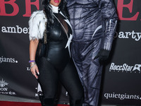 Jannine Vecchil and Gerard Smalls arrive at Amberween - An Amber Rose Birthday Party held at a Private Residence on October 19, 2024 in Tarz...