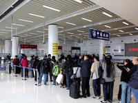 Passengers board a ferry after customs clearance at Lianyungang International Passenger Station in Lianyungang, China, on October 21, 2024....