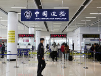 Passengers board a ferry after customs clearance at Lianyungang International Passenger Station in Lianyungang, China, on October 21, 2024....