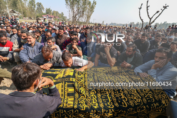 People wail during the funeral of a doctor who is killed in an alleged militant attack in the Nadigam area of Budgam district, Indian-admini...