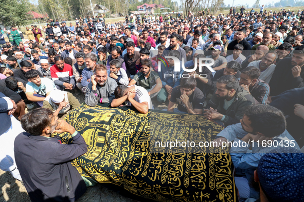 People wail during the funeral of a doctor who is killed in an alleged militant attack in the Nadigam area of Budgam district, Indian-admini...