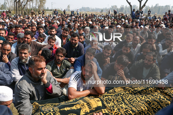 People wail during the funeral of a doctor who is killed in an alleged militant attack in the Nadigam area of Budgam district, Indian-admini...