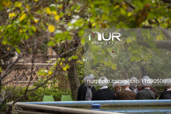 Iranian clerics sit together at a seminary in the historical city of Tabriz, located 624 km (388 miles) northwest of Tehran in the Eastern A...