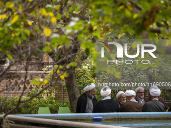 Iranian clerics sit together at a seminary in the historical city of Tabriz, located 624 km (388 miles) northwest of Tehran in the Eastern A...