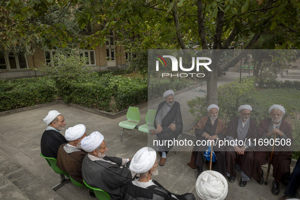 Iranian clerics sit together at a seminary in the historical city of Tabriz, located 624 km (388 miles) northwest of Tehran in the Eastern A...