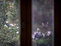 An Iranian cleric sits at a seminary in the historical city of Tabriz, located 624 km (388 miles) northwest of Tehran in the Eastern Azerbai...