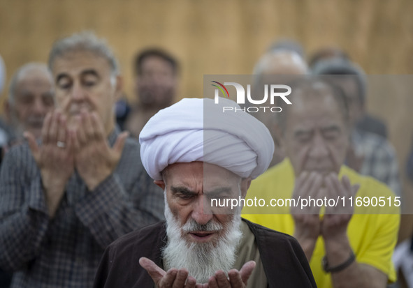 An Iranian cleric leads a mass prayer ceremony at a mosque in the historical city of Tabriz, located 624 km (388 miles) northwest of Tehran...