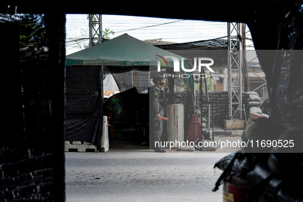 Armed soldiers work at a checkpoint in Yala Province, Thailand, on October 21, 2024. Yala is one of three provinces in Thailand's Deep South...