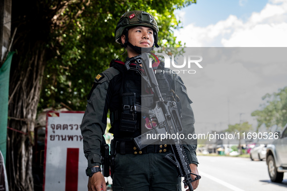 Armed soldiers work at a checkpoint in Yala Province, Thailand, on October 21, 2024. Yala is one of three provinces in Thailand's Deep South...