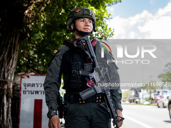 Armed soldiers work at a checkpoint in Yala Province, Thailand, on October 21, 2024. Yala is one of three provinces in Thailand's Deep South...