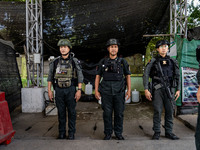 Armed soldiers work at a checkpoint in Yala Province, Thailand, on October 21, 2024. Yala is one of three provinces in Thailand's Deep South...