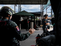 Armed soldiers work at a checkpoint in Yala Province, Thailand, on October 21, 2024. Yala is one of three provinces in Thailand's Deep South...