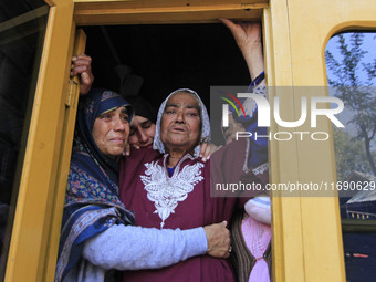 In Budgam, Kashmir, India, on October 21, 2024, the aunt of Doctor Shahnawaz Ahmad Dar wails during his funeral ceremony at his native villa...