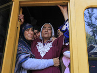 In Budgam, Kashmir, India, on October 21, 2024, the aunt of Doctor Shahnawaz Ahmad Dar wails during his funeral ceremony at his native villa...