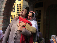 In Budgam, Kashmir, India, on October 21, 2024, a sister mourns over the dead body of Doctor Shahnawaz Ahmad Dar during his funeral ceremony...