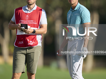 Johannes Veerman of the USA talks with his caddie on the 2nd hole during day four of the Estrella Damm N.A. Andalucia Masters 2024 at Real C...