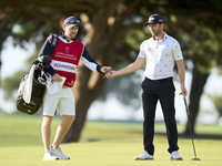 Marcel Schneider of Germany talks with his caddie on the 1st green during day four of the Estrella Damm N.A. Andalucia Masters 2024 at Real...