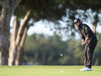 Angel Hidalgo of Spain plays a shot on the 1st green during day four of the Estrella Damm N.A. Andalucia Masters 2024 at Real Club de Golf S...