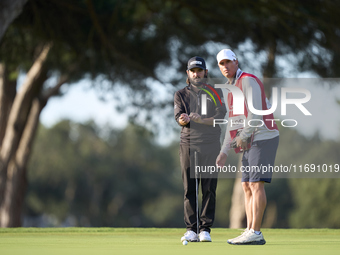 Angel Hidalgo of Spain talks with his caddie on the 1st green during day four of the Estrella Damm N.A. Andalucia Masters 2024 at Real Club...