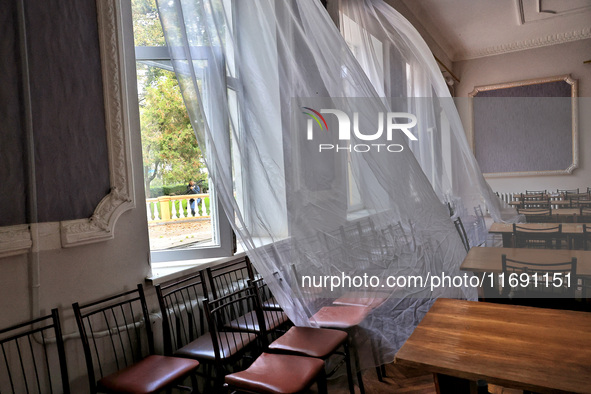 Curtains fly in a room damaged by the October 18 Russian missile strike in Odesa, Ukraine, on October 19, 2024. NO USE RUSSIA. NO USE BELARU...