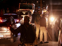 People from all walks of life protest against recent targeted killings of Indian laborers working in Ganderbal amid tight security in Baramu...