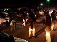 People from all walks of life protest against recent targeted killings of Indian laborers working in Ganderbal amid tight security in Baramu...