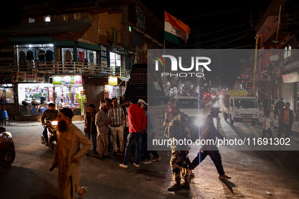 People from all walks of life protest against recent targeted killings of Indian laborers working in Ganderbal amid tight security in Baramu...