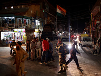 People from all walks of life protest against recent targeted killings of Indian laborers working in Ganderbal amid tight security in Baramu...