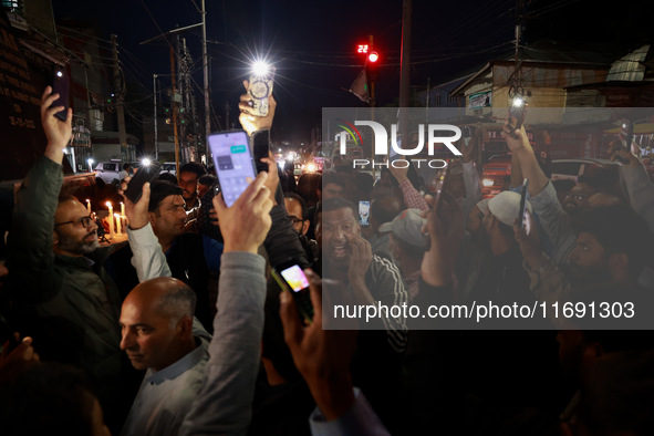 People from all walks of life protest against recent targeted killings of Indian laborers working in Ganderbal amid tight security in Baramu...