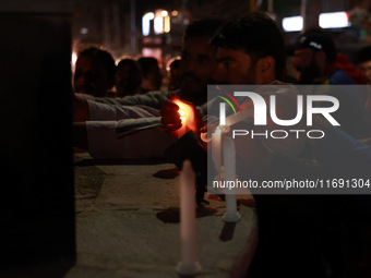 People from all walks of life protest against recent targeted killings of Indian laborers working in Ganderbal amid tight security in Baramu...