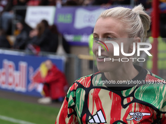 Leah Williamson of Arsenal participates in the pre-match warm-up during the Barclays FA Women's Super League soccer match between West Ham U...