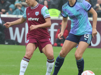 Riko Ueki of West Ham United WFC and Lia Walti of Arsenal are in action during the Barclays FA Women's Super League soccer match between Wes...