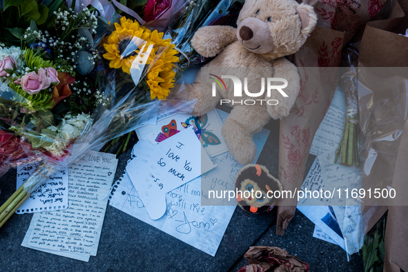 Flowers and cards are left at a memorial dedicated to former One Direction singer Liam Payne at Washington Square Park in New York, New York...