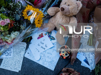 Flowers and cards are left at a memorial dedicated to former One Direction singer Liam Payne at Washington Square Park in New York, New York...