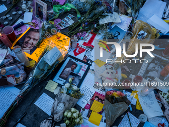 Flowers and cards are left at a memorial dedicated to former One Direction singer Liam Payne at Washington Square Park in New York, New York...