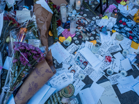 Flowers and cards are left at a memorial dedicated to former One Direction singer Liam Payne at Washington Square Park in New York, New York...