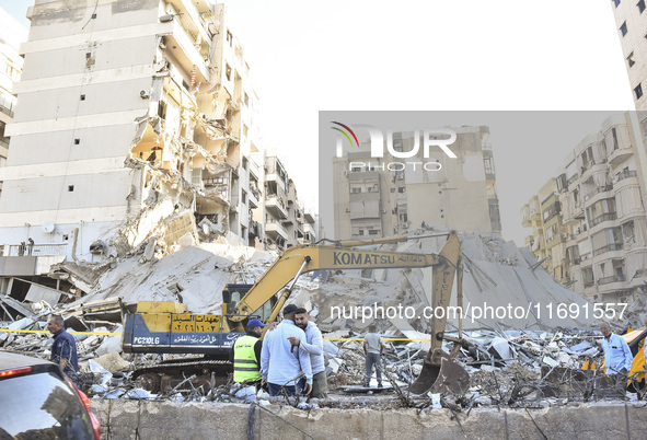 A view of the destruction after the Israeli army targets Bank Kared Al Hassan with a series of airstrikes on the suburb of Dahieh, as debris...