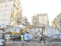 A view of the destruction after the Israeli army targets Bank Kared Al Hassan with a series of airstrikes on the suburb of Dahieh, as debris...