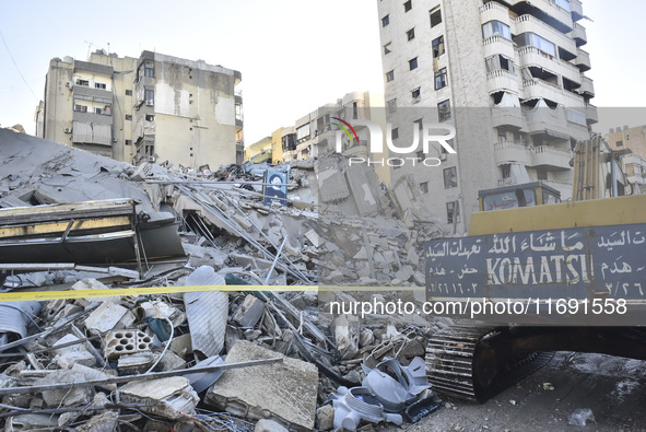 A view of the destruction after the Israeli army targets Bank Kared Al Hassan with a series of airstrikes on the suburb of Dahieh, as debris...