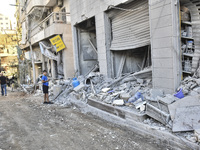 A view of the destruction after the Israeli army targets Bank Kared Al Hassan with a series of airstrikes on the suburb of Dahieh, as debris...