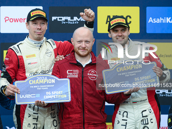 Driver Nikolay Gryazin and co-driver Konstantin Aleksandrov of the team AEC - DG Sport Competition Citroen C3 celebrate the final podium Ral...