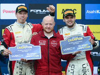 Driver Nikolay Gryazin and co-driver Konstantin Aleksandrov of the team AEC - DG Sport Competition Citroen C3 celebrate the final podium Ral...