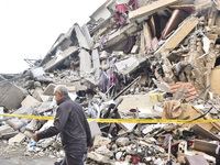 A view of the destruction after the Israeli army targets Bank Kared Al Hassan with a series of airstrikes on the suburb of Dahieh, as debris...