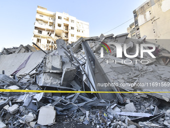 A view of the destruction after the Israeli army targets Bank Kared Al Hassan with a series of airstrikes on the suburb of Dahieh, as debris...